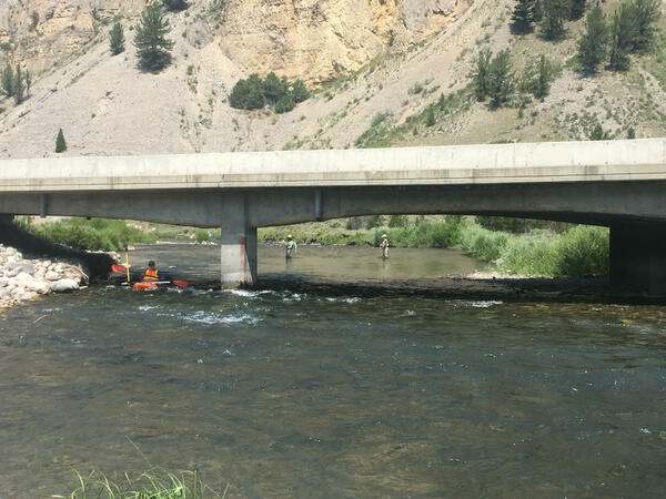 Using kayak to measure cross-sectional depth and water surface of Gallatin River