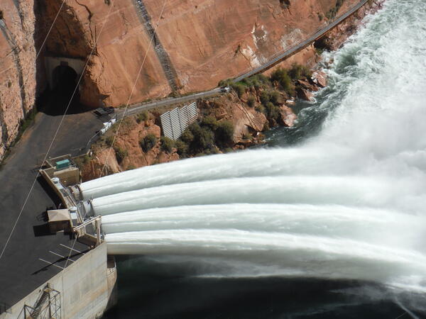 Glen Canyon Dam jet tubes releasing water into the Colorado River for a high flow experiment.