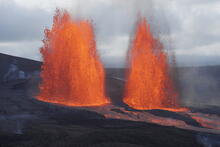 Two glowing lava fountains erupting simultaneously at Kīlauea's summit