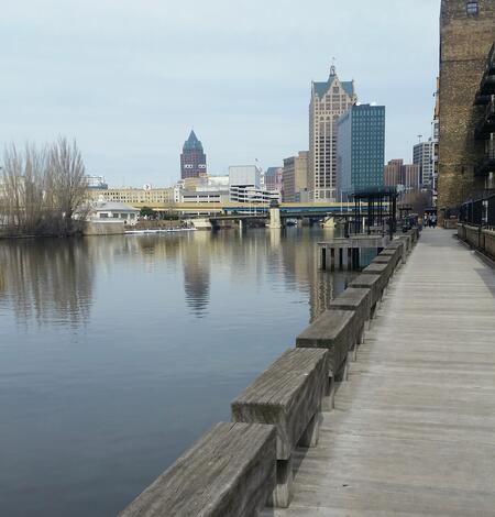 Boardwalk along Milwaukee River looking into downtown Milwaukee