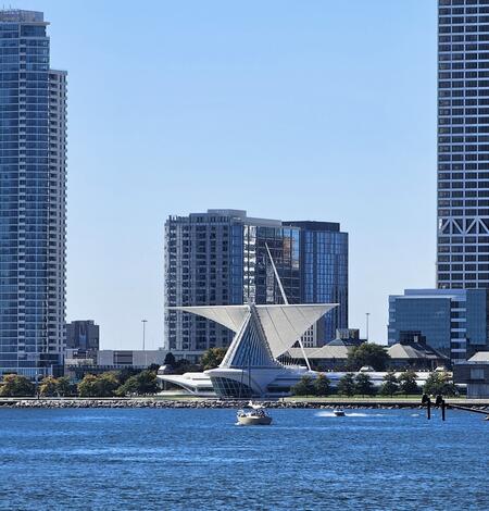 Modern Milwaukee skyline with the Milwaukee Art Museum's white, wing-like brise soleil prominently displayed on waterfront