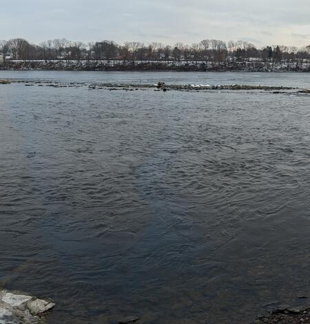 A wide angle view of a river during winter.