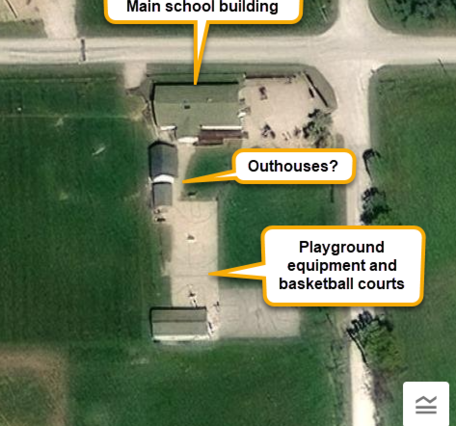 Aerial imagery of the Green Acres Amish School showing school building, possible outhouses, and playground features.