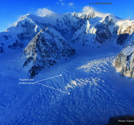 Snowy mountain with labels pointing out toppled and broken seracs 