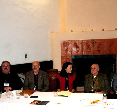 Scientists sitting at a table