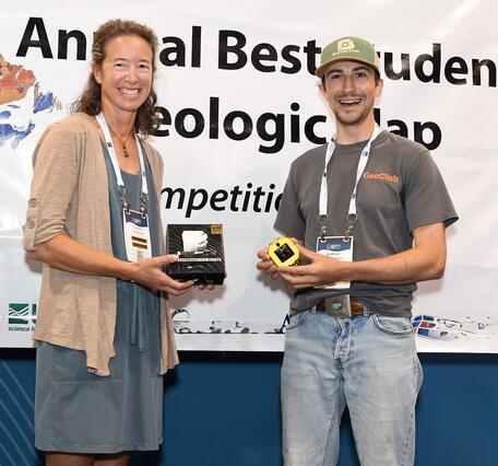  AASG President Jessica Moore and Brunton CEO Lauren Heerschap present BSGMC winner Andrew Yokel-Deliduka with the 1st place prize