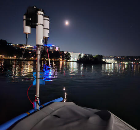 light sensor attached to boat on the water at Lake Washington at night