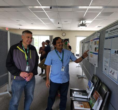 Flagstaff  Science Campus members at the Poster Social sharing their research
