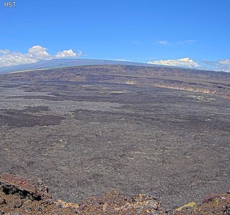 Color webcam image of lava fountain erupting within a volcanic crater