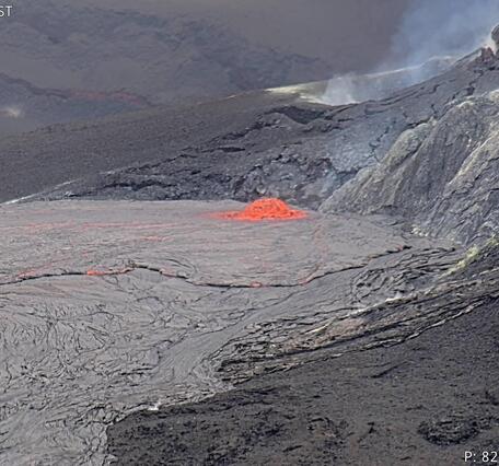 Color photograph of dome lava fountain erupting from a volcanic vent