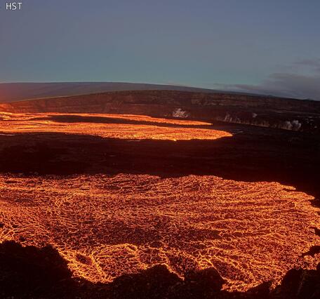 Color photograph of lava fountain and lava flows