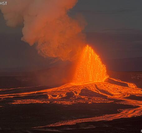 Color photograph of lava fountain and lava flows