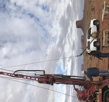 Drilling and installation of monitoring wells at trench infiltration site in Monument Valley, Utah, Navajo Nation Reservation