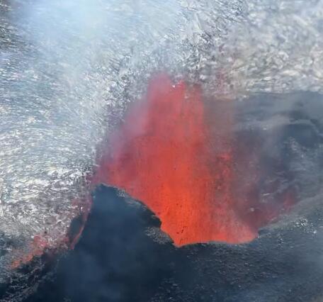 Color photograph of erupting vent