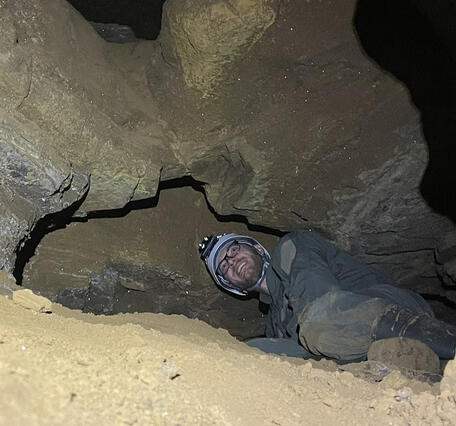 Geologist samples cave sediment