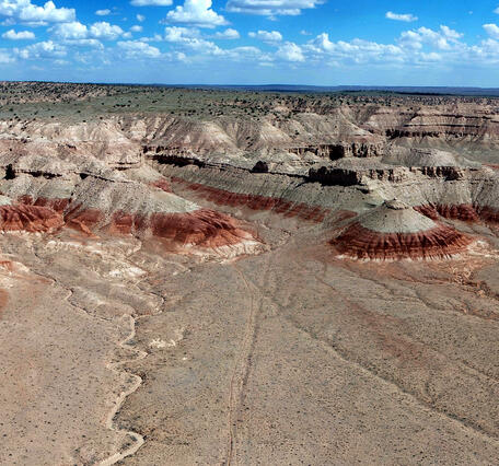Bidahochi Basin, dry bed of a prehistoric lake east of Flagstaff, Arizona. Aerial view from a drone over Navajo land. Anyone wishing to conduct unmanned aerial vehicle flights on the Navajo Nation must first apply for and receive a permit from the Navajo Department of Transportation. Photo by Brian Gootee, Arizona Geological Survey. 
