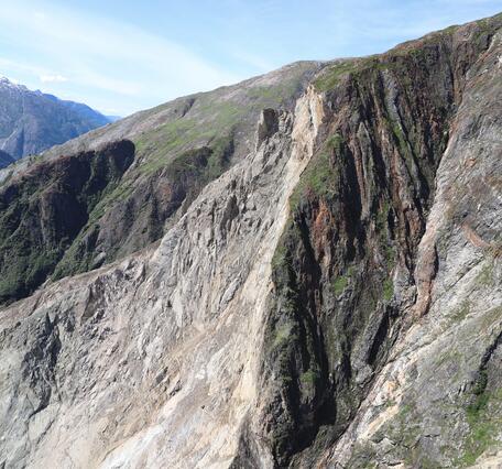 Photo of mountainside with landslide headscarp