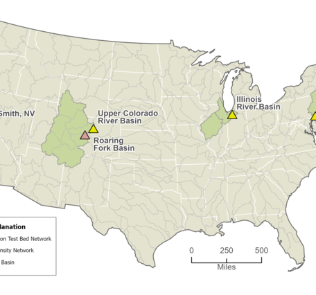 Sage‑green map of the U.S. showing CRNS monitoring sites as triangle markers and associated basins in darker sage green.