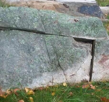 A large fracture in a granite rock. 
