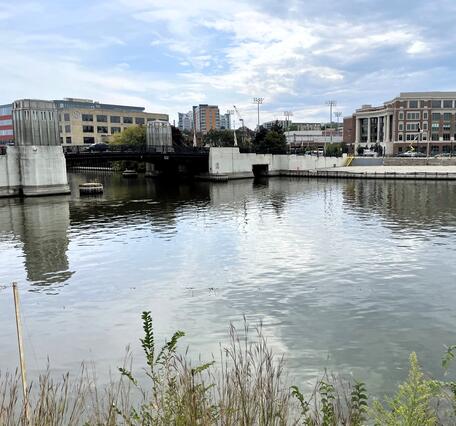 View of bridge over urban river