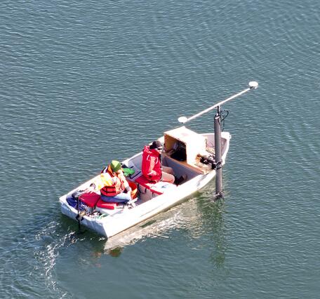 small boat on pond