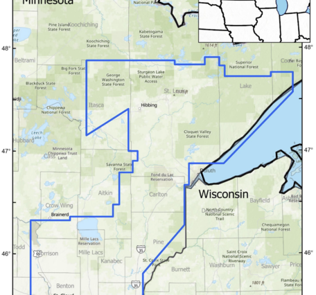 Map of Northern Minnesota showing an irregular blue polygon, the outline of Earth MRI survey flights over the Duluth Complex.