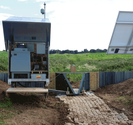 Photos of various edge-of-field monitoring sites, installation efforts, and runoff events across the Great Lakes basin.