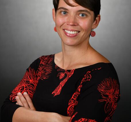 Color photograph of a scientist taken in a photographer studio