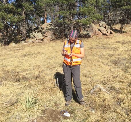 scientist standing in field