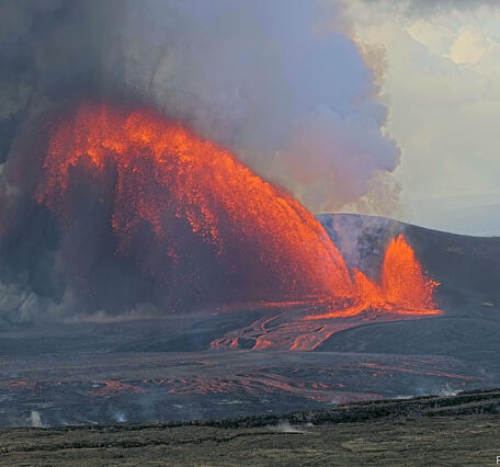 Color photograph of lava fountaining