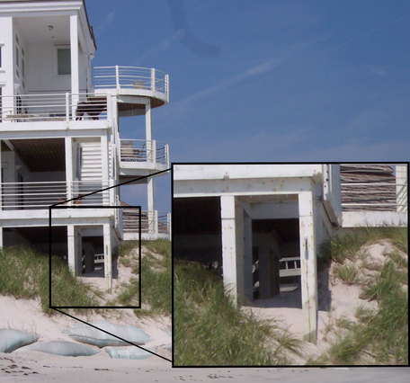A beach home with exposed support columns at the edge of an eroded dune, Figure Eight Island, NC with inset