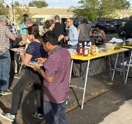 This photo shows Flagstaff Science Campus employees with the Director's Office at the campus barbecue 