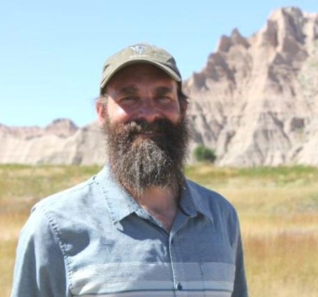 Portrait of Gregor Schuurman in Badlands National Park.