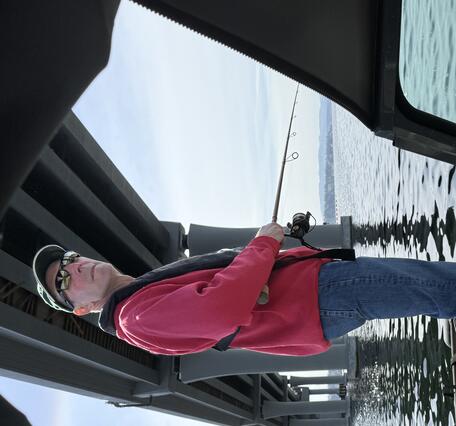 scientist on boat fishing