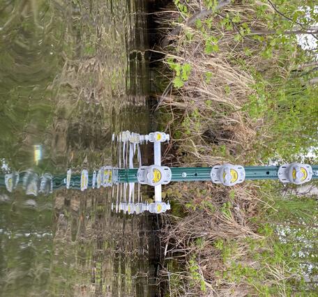 USGS researchers deploy a wake detection array at Big Lake, Alaska