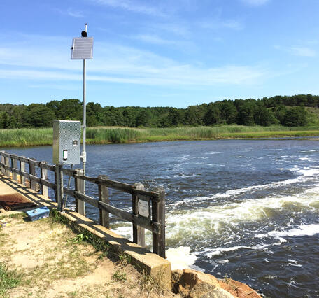 Upstream side of USGS Station 011058798, Herring River at Chequessett Neck Road Dike