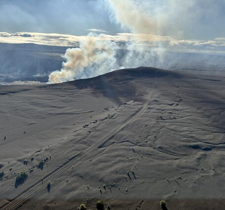 Color photograph of degassing volcanic vent 