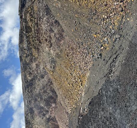 Color photograph of weather crater wall