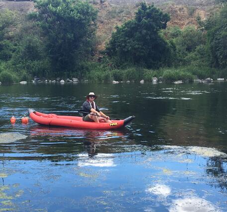 Scientist in kayak