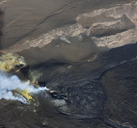 Color photograph of volcanic vents degassing