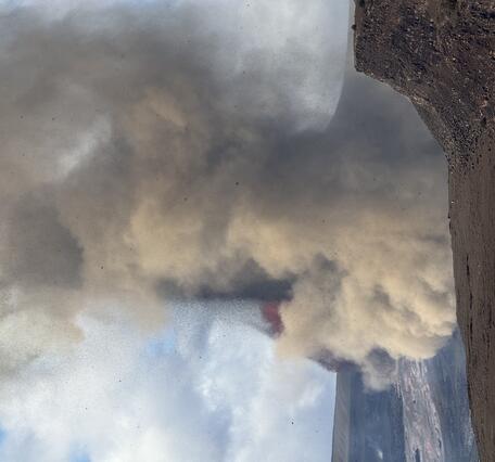 Color photograph of volcanic plume