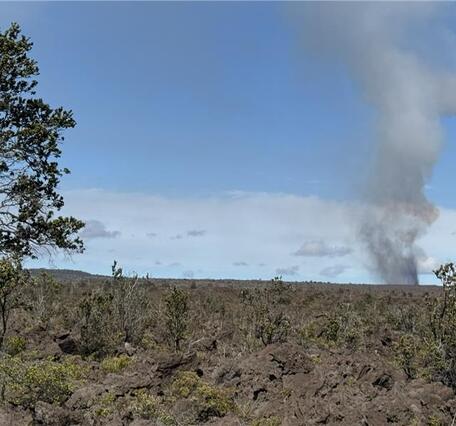 Color photograph of volcanic plume