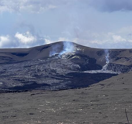 Color photograph of volcanic vents degassing