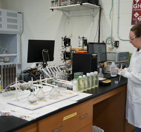 USGS scientist working in a laboratory
