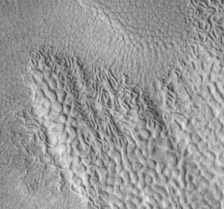 Nasa's HiRise image taken aboard the MRO that shows possible vurrent or water ice.
