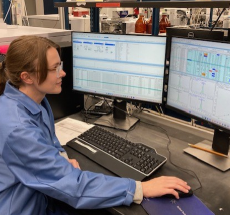 chemist reviewing water sample analysis results