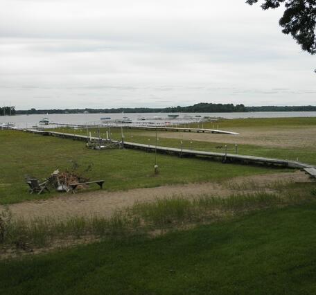 Photo showing low water levels and dock extensions on White Bear Lake, Minnesota.