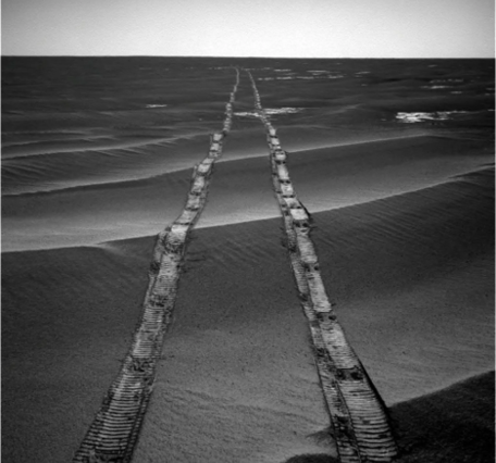 This is a photo of the Opportunity rover tracks on Mars.