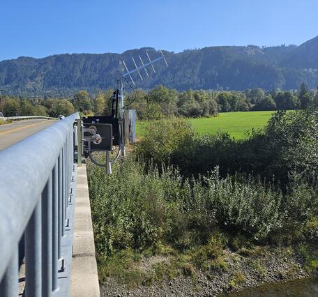 Radar equipment mounted to the side of a road bridge