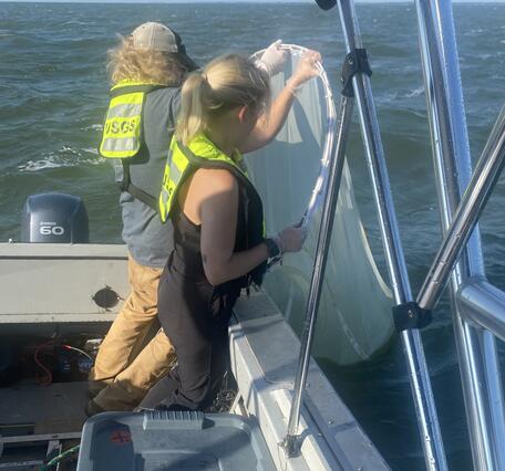 USGS scientists collecting phytoplankton for mercury and PFAS analyses in Saginaw Bay of Lake Huron​